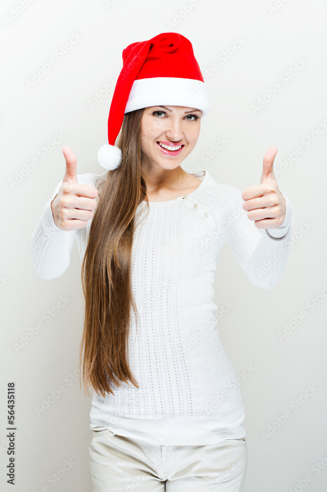 Christmas Santa hat woman portrait . Smiling happy girl . thumb Christmas Santa hat woman portrait . Smiling happy girl . thumb