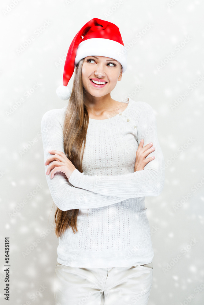 Christmas Santa hat  woman portrait . Smiling happy girl .