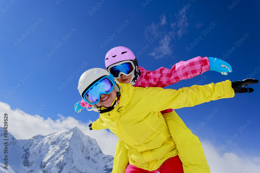 Ski, skier, snow  and fun  - family enjoying winter
