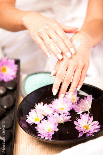 Healthy Hands.Female applying moisturizer to her Hands