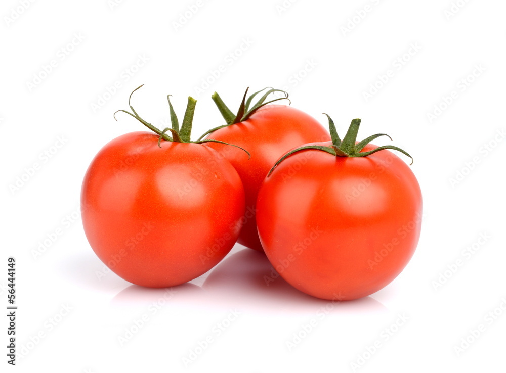 Three red deliciuos tomatoes isolated on white Three red deliciuos tomatoes isolated on white
