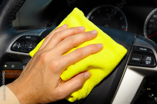 Hand cleaning car.