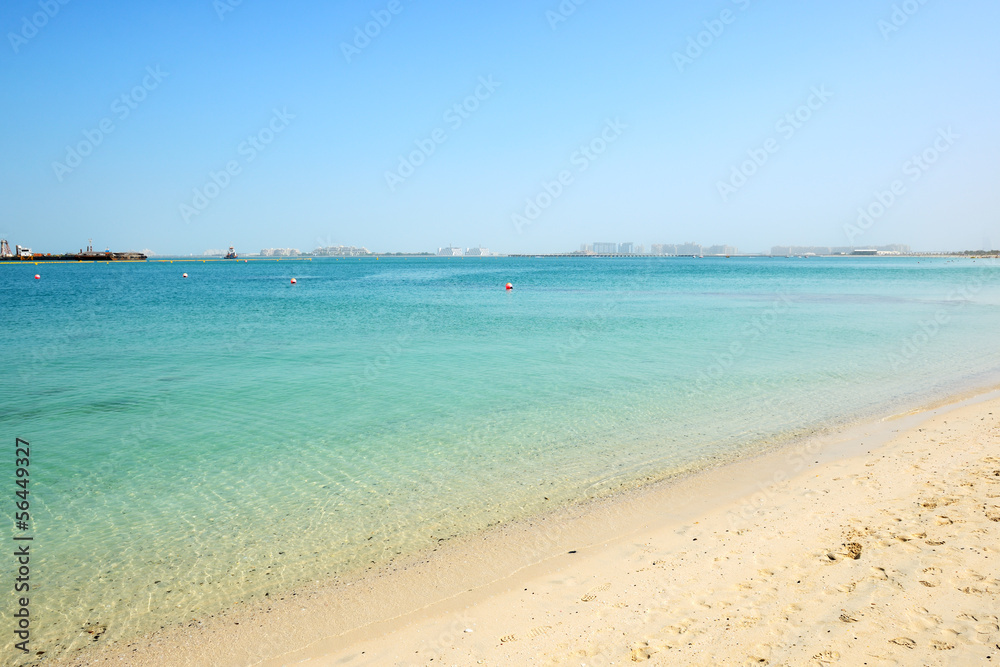 Beach of the luxury hotel with a view on Palm Jumeirah man-made