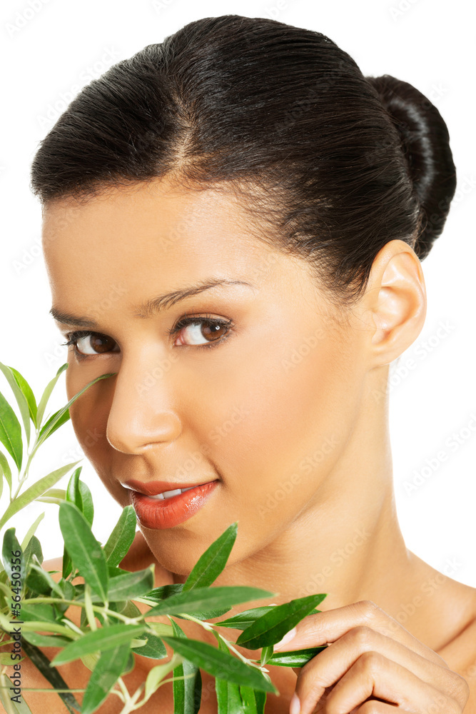 Woman with health skin and with olive tree Woman with health skin and with olive tree