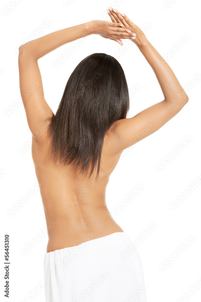 Young beautiful nude woman after bath or spa with towel Young beautiful nude woman after bath or spa with towel