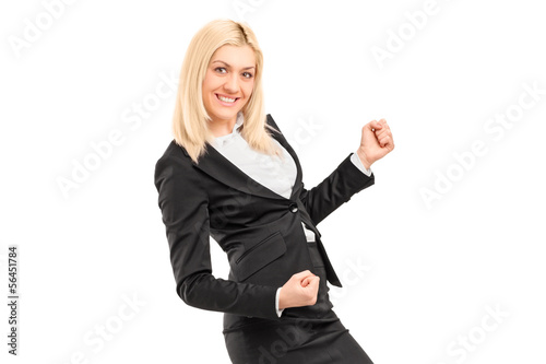 Young businesswoman gesturing happiness