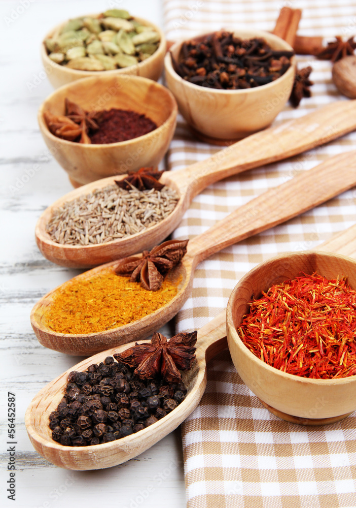 Various spices and herbs on table close up Various spices and herbs on table close up
