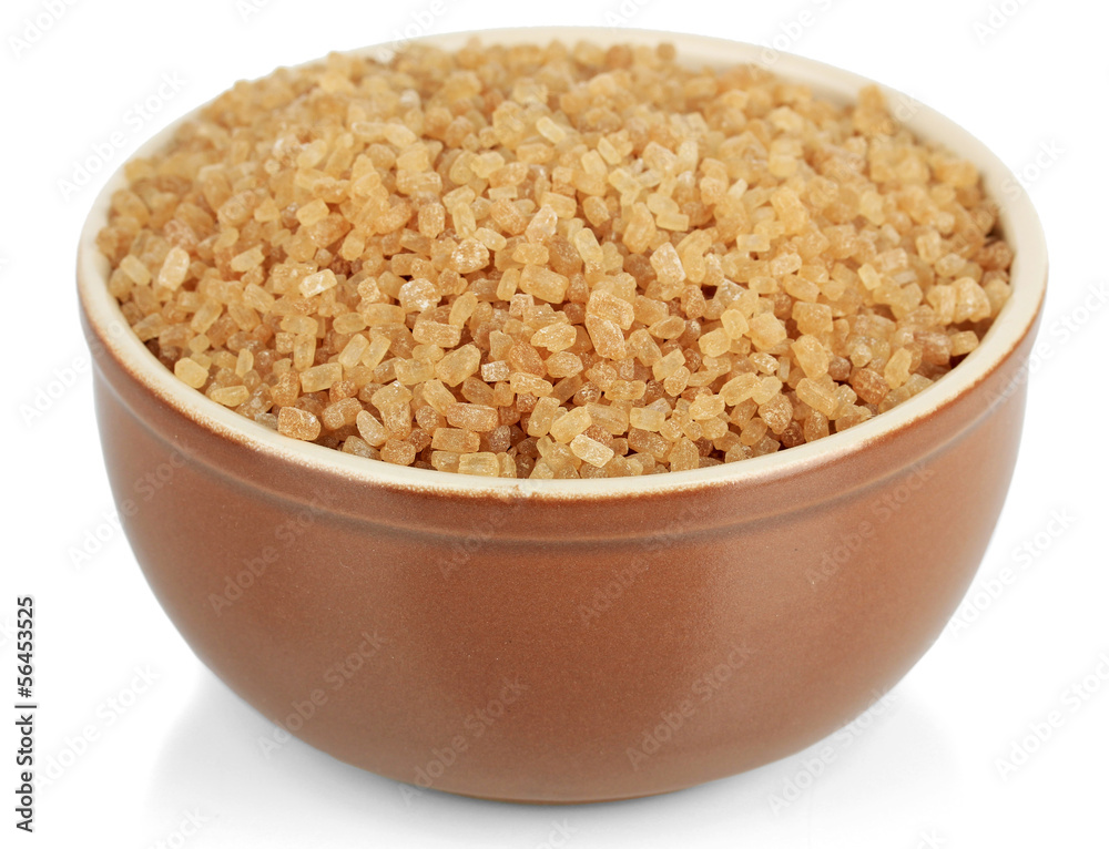 Brown sugar in bowl isolated on white Brown sugar in bowl isolated on white
