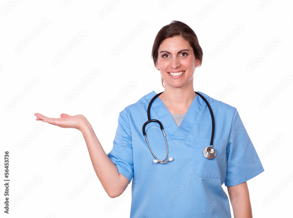 Pretty young woman smiling holding her palm out Pretty young woman smiling holding her palm out
