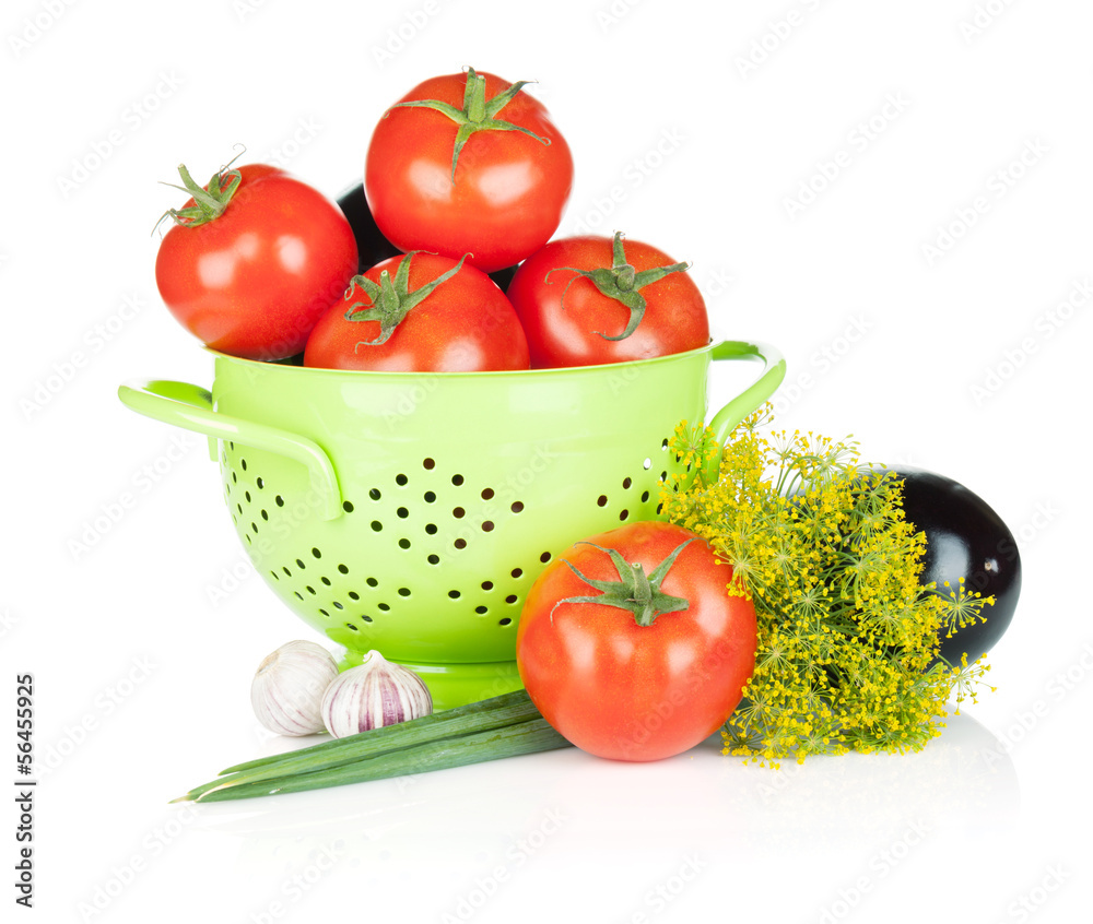 Fresh ripe vegetables in colander