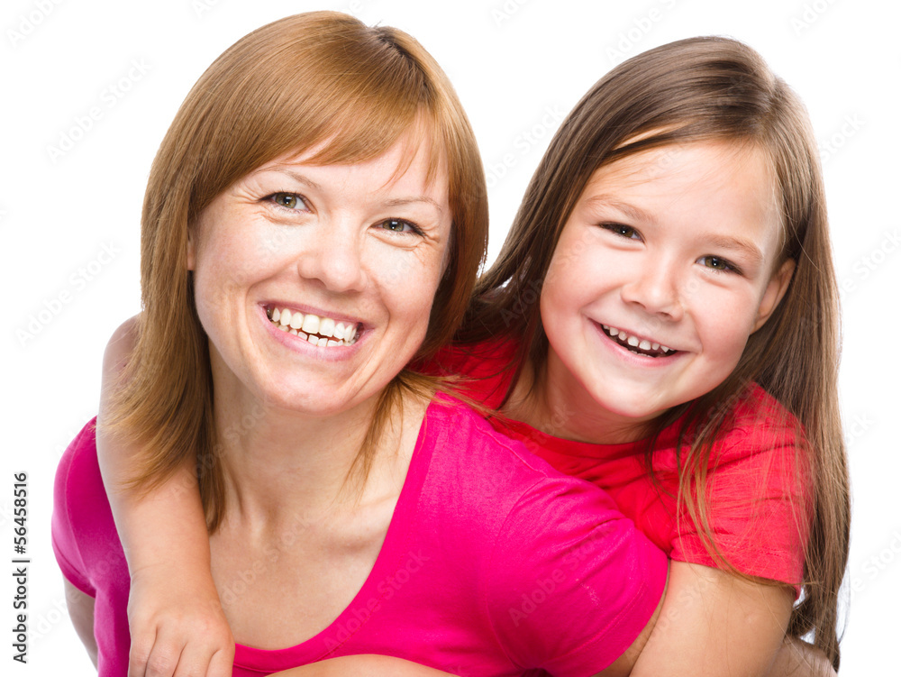Portrait of a happy mother with her daughter Portrait of a happy mother with her daughter