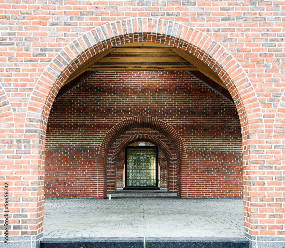 Fototapeta premium Glass Block Window Through Brick Arches