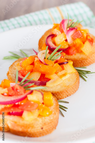 Bruschetta with fresh tomatoes and red onion