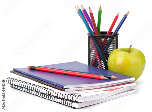 Notebook stack and pencils. Schoolchild and student studies acce photo