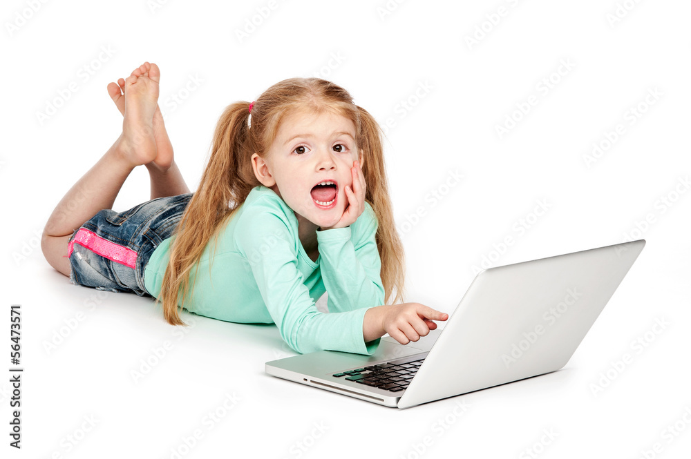 Small Girl Pointing At Laptop Computer Small Girl Pointing At Laptop Computer