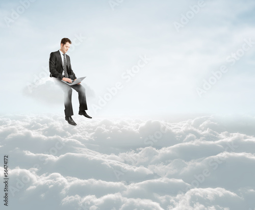 businessman sitting on cloud