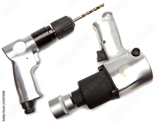 air impact wrench and reversible air drill on white background