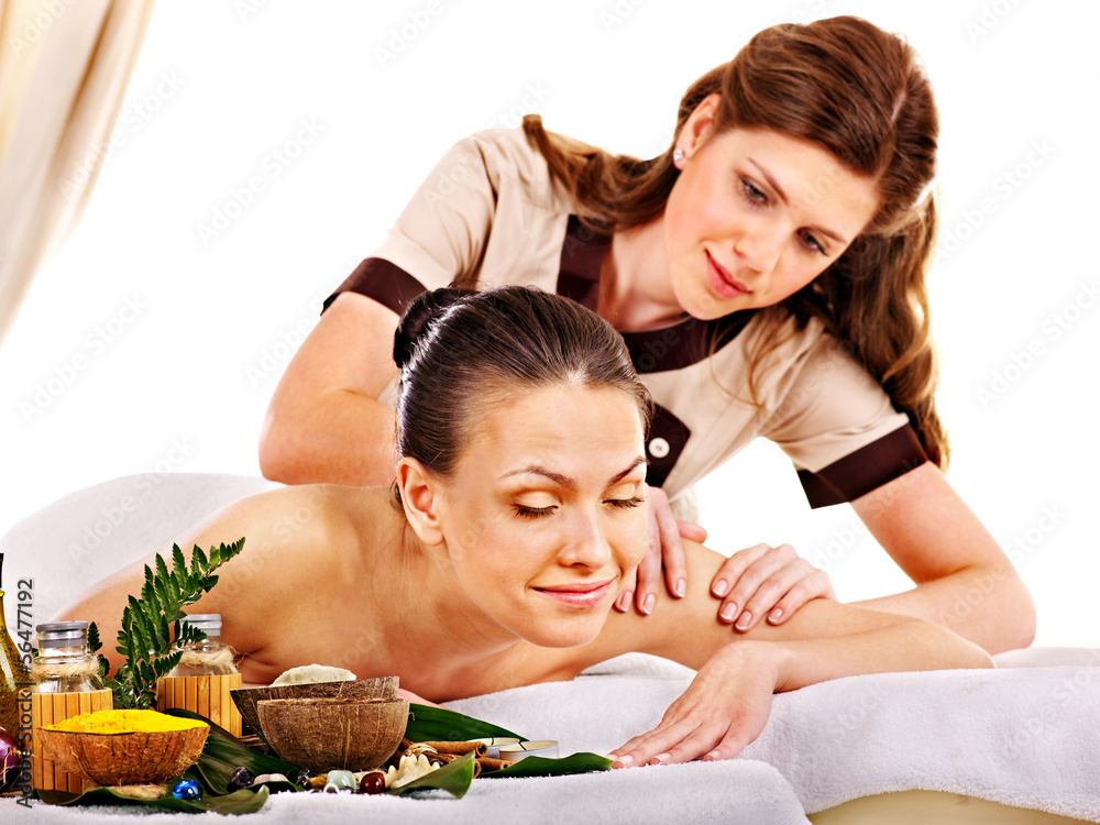 Woman getting spa lastone therapy outdoor.