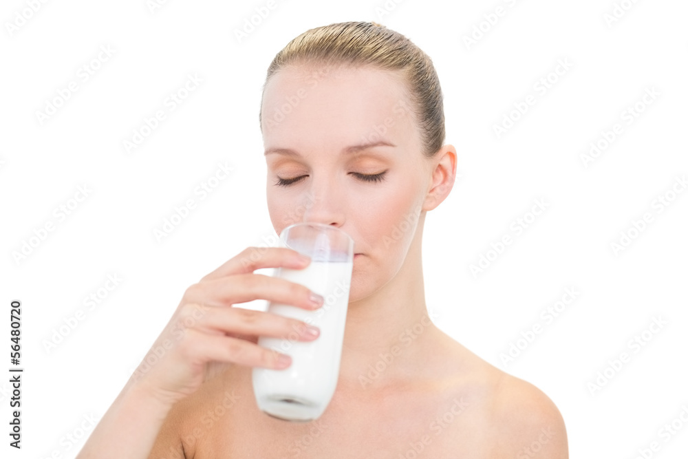 Delighted pretty blonde model drinking milk Delighted pretty blonde model drinking milk