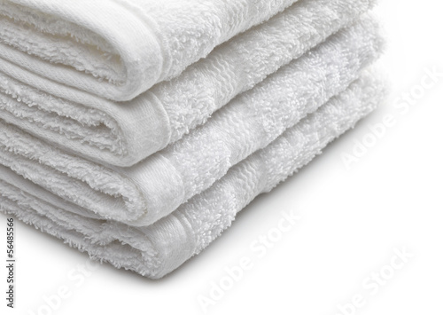 Stack of white hotel towels on a white background