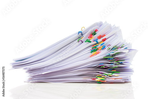 Pile of paper with colorful clips photo