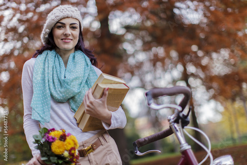 Young woman with a bicycle