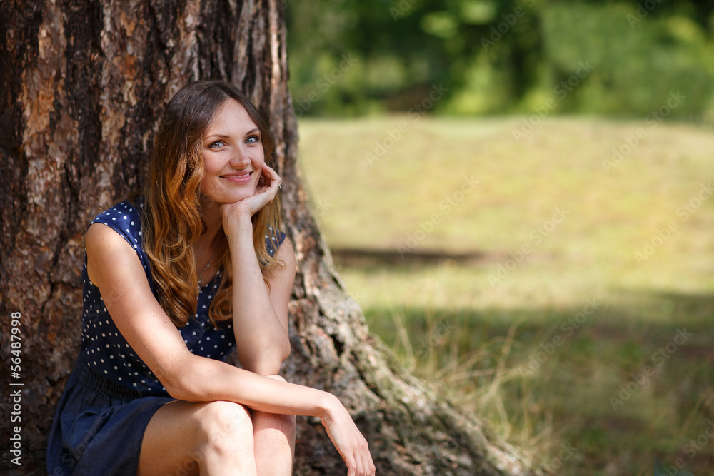 Portrait of young beautiful woman in summer forest Portrait of young beautiful woman in summer forest
