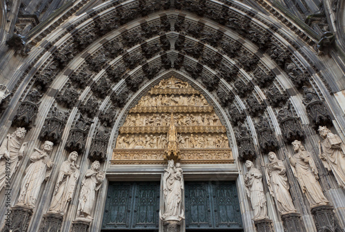 Details of stone figures on the facade of Cologne cathedral