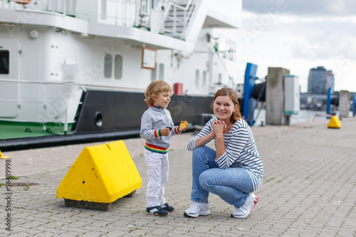 Little boy having fun in city harbor, Germany