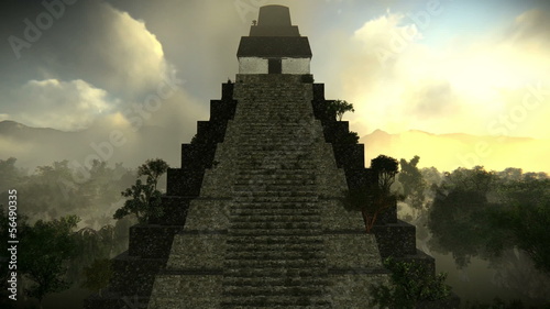 Aerial view of an ancient pyramid in the forest in Tikal.