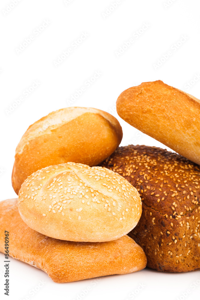 assortment of baked bread isolated on white background