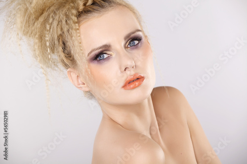 Young pretty woman with beautiful blond hairs