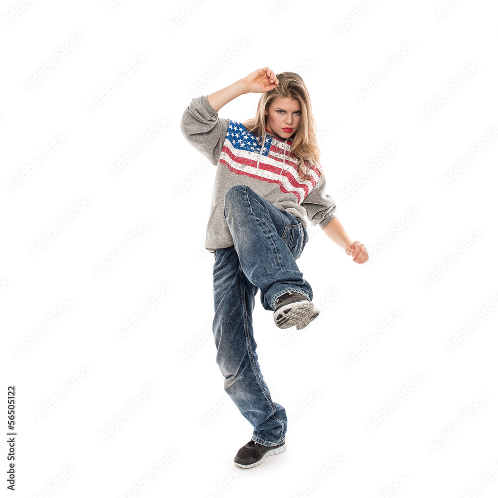 Young woman performer dancing hip hop in studio, isolated Young woman performer dancing hip hop in studio, isolated