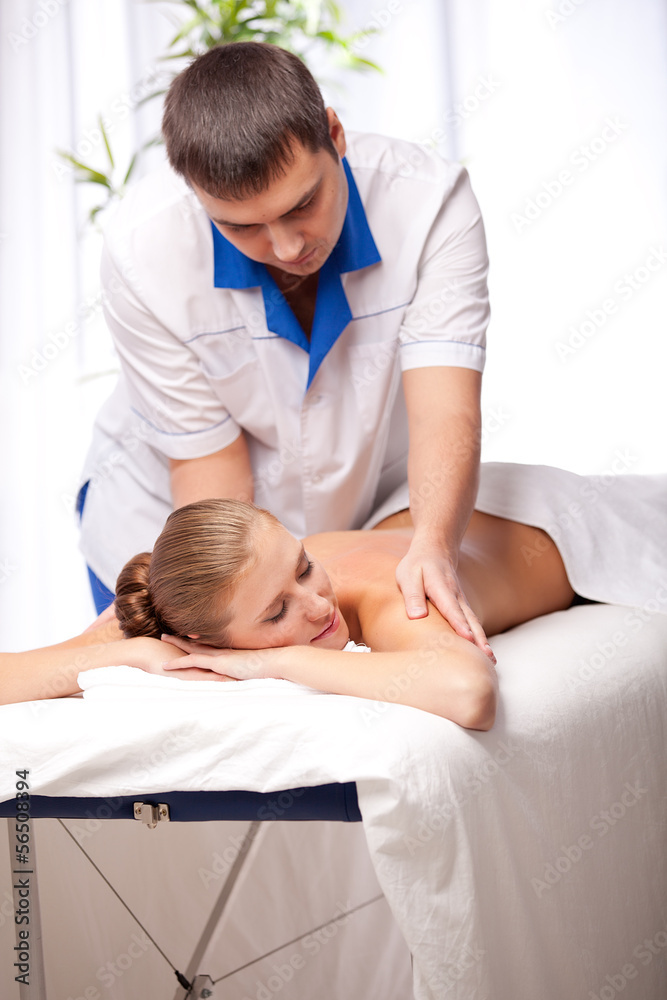 Masseur is massaging female Masseur is massaging female