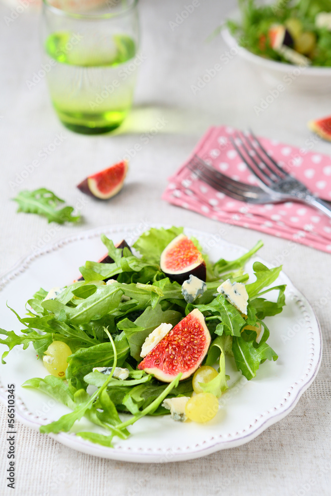 fresh salad with brie cheese, rocket salad and grapes fresh salad with brie cheese, rocket salad and grapes