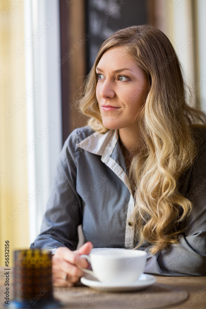 Woman With Coffee Cup Looking Out Window Woman With Coffee Cup Looking Out Window