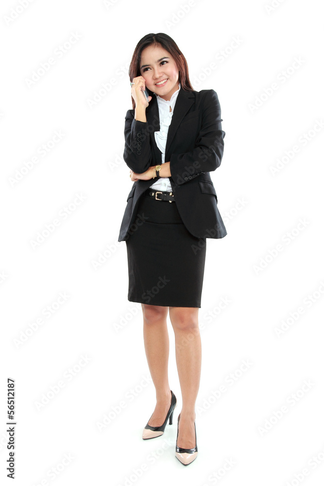 Attractive business woman using a mobile phone Attractive business woman using a mobile phone