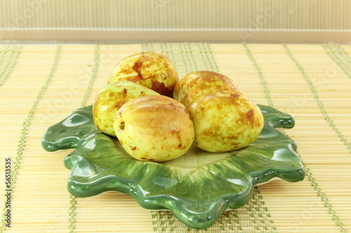 indian jujube on plate closeup photo