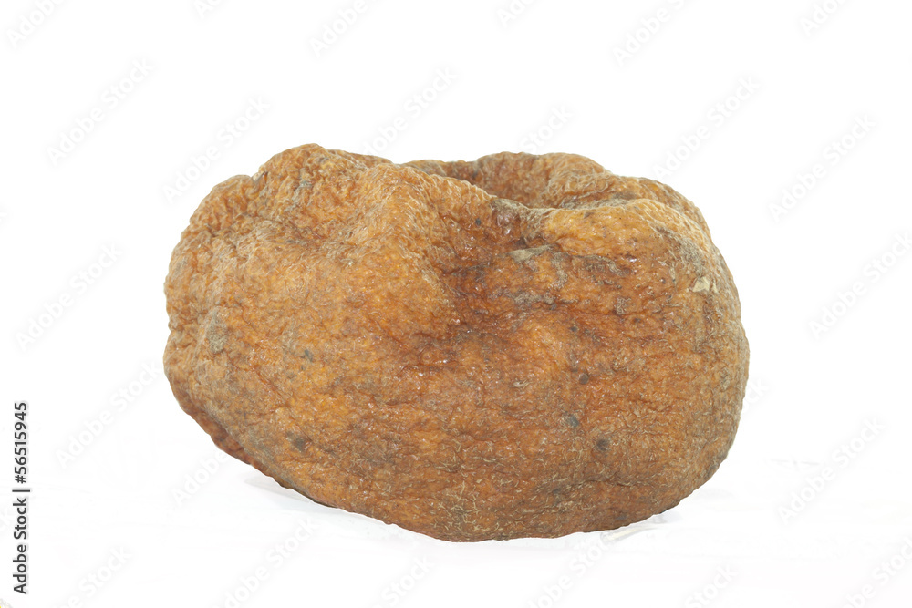 Dry orange on white in concept dry skin or hair Dry orange on white in concept dry skin or hair
