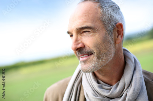 Portrait of smiling mature handsome guy