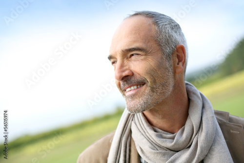 Portrait of smiling mature handsome guy