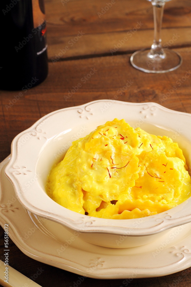Ravioli with saffron cream sauce