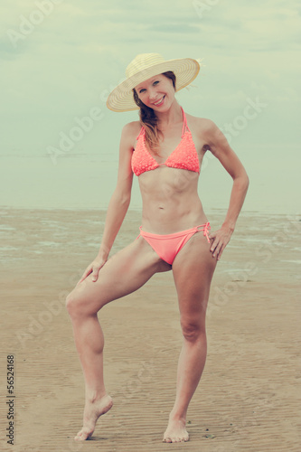 Girl wearing bikini and hat