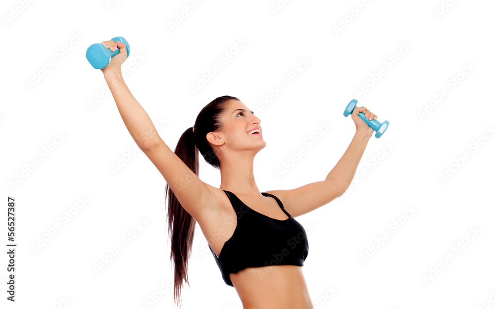 Happy brunette girl toning the muscles Happy brunette girl toning the muscles