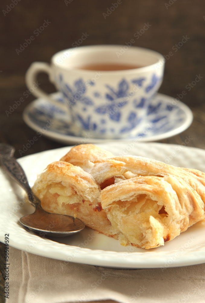 Slice of apple strudel and cup of tea Slice of apple strudel and cup of tea