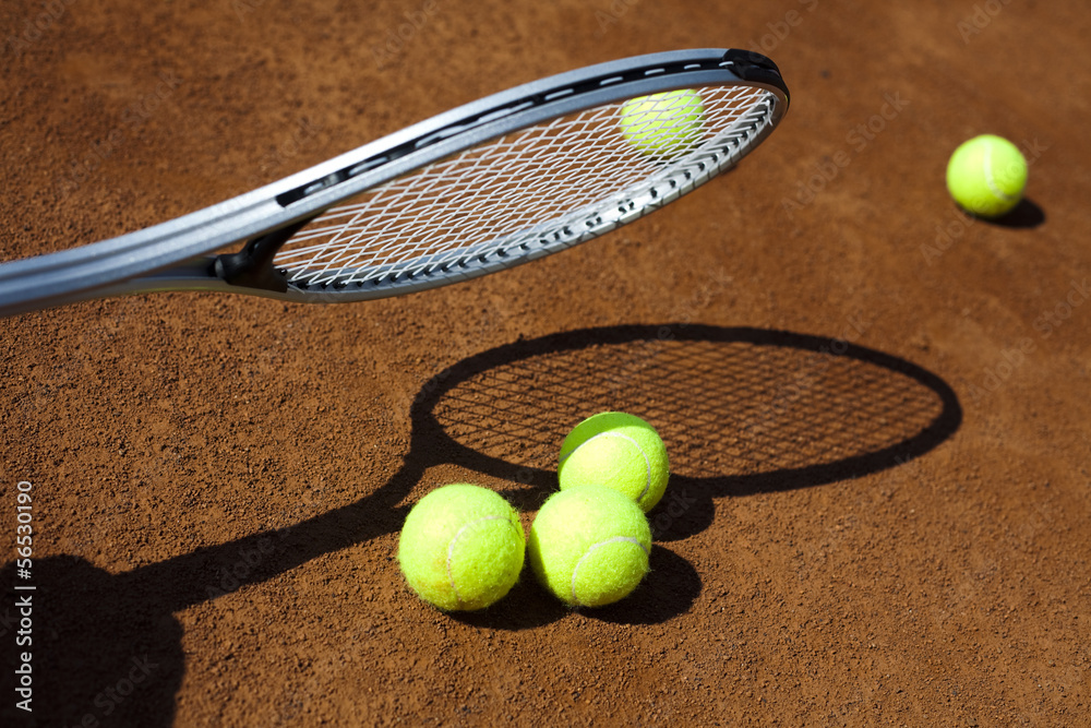 Tennis racket and balls, court