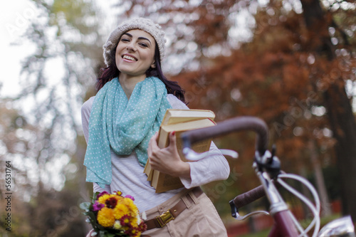 Young woman with a bicycle