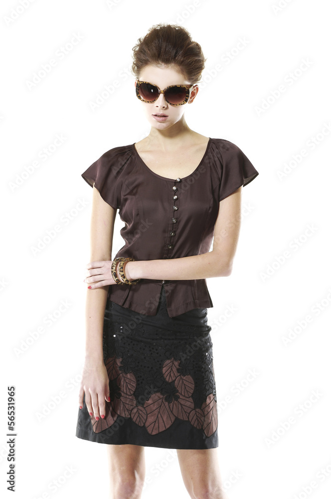 Fototapeta premium casual young woman in sunglasses standing