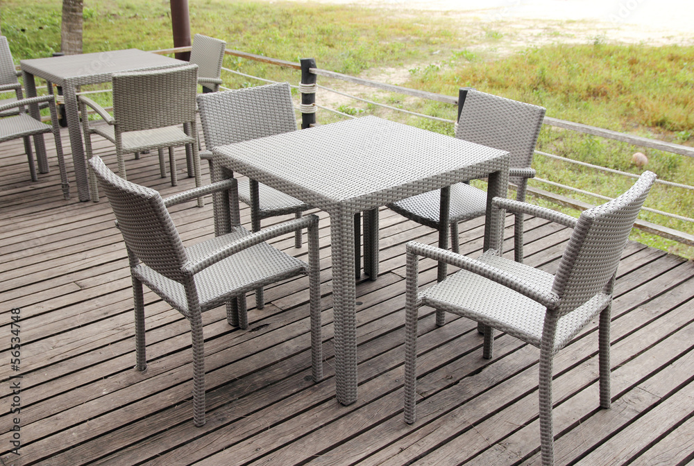 Outdoor restaurant with tables and chairs in resort