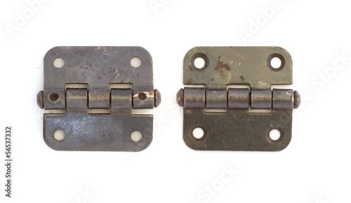 Old door hinges isolated on white